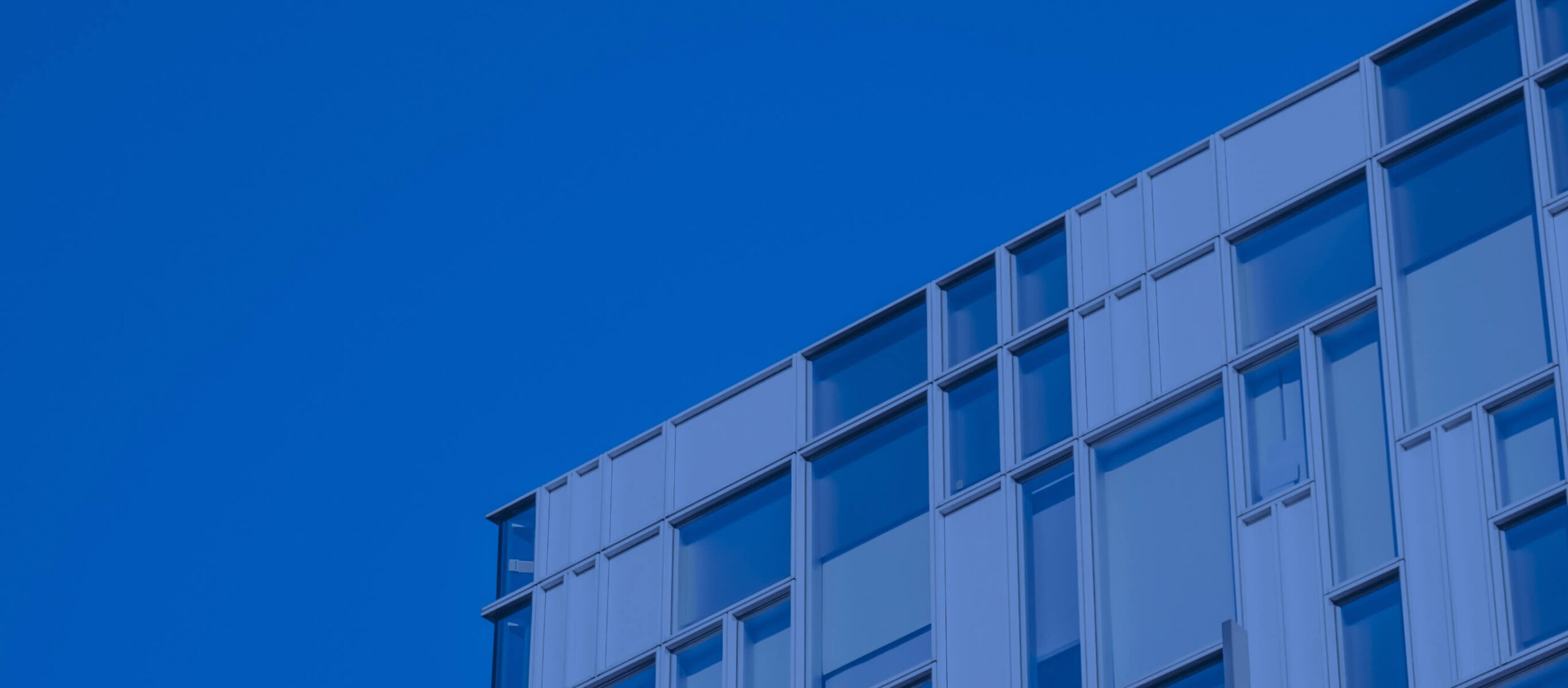 Blue image of top of flats